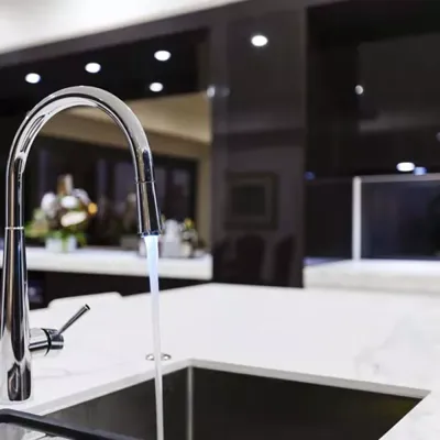 Beautiful bright white modern engineered stone countertop manufactured with LUMINEX ultrawhite filler for superior truetone white and color consistency.