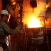 men working in metals foundry